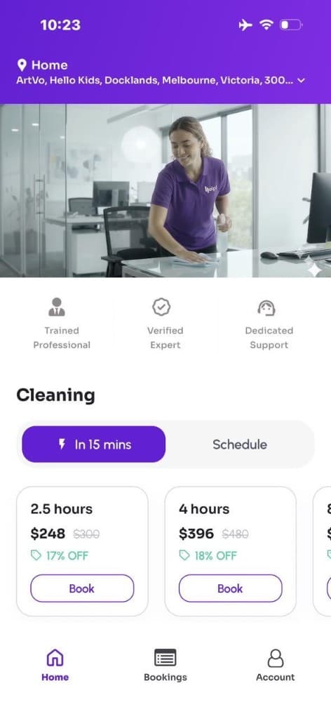Helpi cleaner wiping an office desk